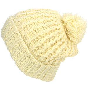 Bonnet à pompon en tricot torsadé - crème